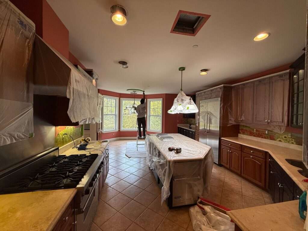 How to Remove Grease and Stains from Painted Cabinets Without Stripping the Paint