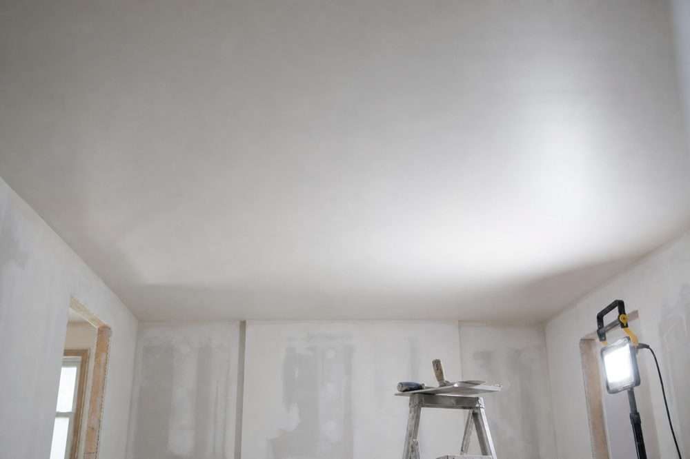 Smooth skim-coated ceiling after popcorn ceiling removal
